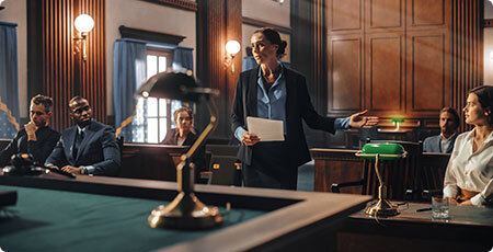 Trial defense law: attorney addressing the court and jury.